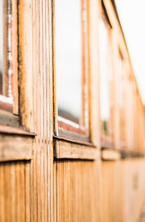 Old wooden railroad carriage by Lars Hallstrom