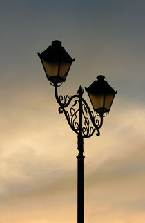 Lantern on the background sky  by Volodymyr Chaban