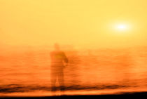 Fishing on the beach in Denmark by fraenks