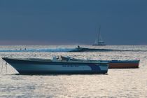 Surfing at Dusk by Udo Behrends