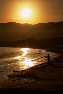 On the beach, at sunset by Giorgio  Perich