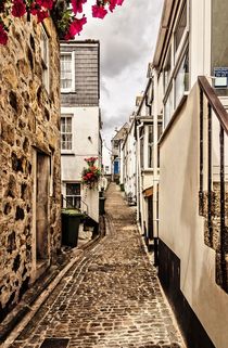 Narrow cobbled street by Jeremy Sage