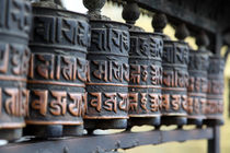 Spinning Buddhist prayer wheels  von studio-octavio