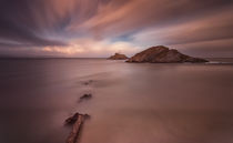 Sunset on Mumbles lighthouse by Leighton Collins