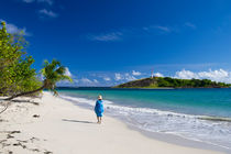 Woman in Blue on Sandy Beach by cinema4design