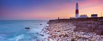 The Portland Bill Lighthouse in Dorset, England at sunset by Sara Winter