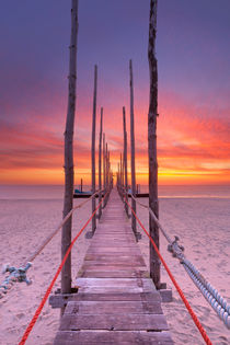 Seaside jetty at sunrise on Texel island, The Netherlands by Sara Winter