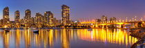 Vancouver, British Columbia, Canada skyline across the water at night by Sara Winter