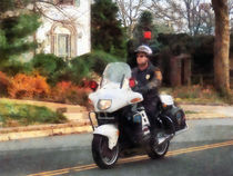 Motorcycle Cop on Patrol by Susan Savad