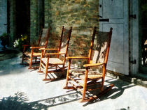 Three Wooden Rocking Chairs on Sunny Porch by Susan Savad