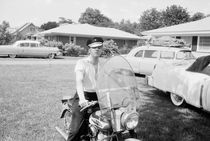 Elvis Presley with his 1956 Harley KH von Phillip Harrington