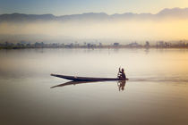 Fisherman on Inle Lake in Myanmar at sunrise by nilaya