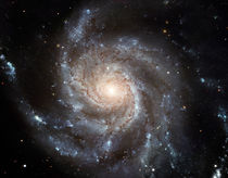 Spiral galaxy Messier 101. by Stocktrek Images