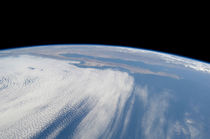 Heavy cloud cover over the Pacific Ocean. by Stocktrek Images