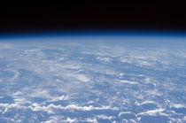 An oblique horizon view of the Earth's atmosphere. by Stocktrek Images