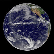 Earth centered over the Pacific Ocean. by Stocktrek Images