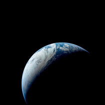 Crescent Earth taken from the Apollo 4 mission. by Stocktrek Images