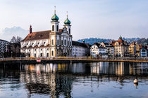 Reflections of a church by Pravine Chester