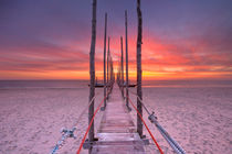 Seaside jetty at sunrise on Texel island, The Netherlands von Sara Winter