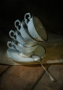 Still life with porcelaine set of cups and silver spoon by Jarek Blaminsky