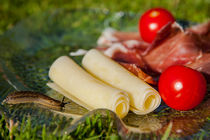 Slug sneaking up on delicatessen on a glass platter by Jessy Libik