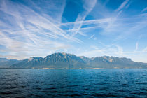 French mountain skyline over the Geneva Lake by Jessy Libik