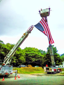 A firetruck ladder that is fully extended  von lanjee chee