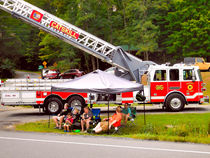 Fire truck with ladder extended on display 1 by lanjee chee