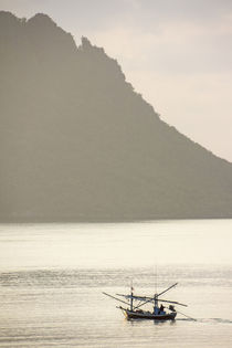 fisherboat and steep islands von anando arnold