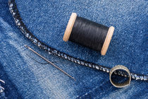 Roll of Black Thread and Jeans by maxal-tamor