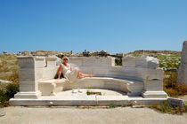 Relax on an antique marble bench  by Yuri Hope