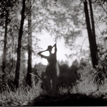 Silhouette of a girl in the forest by Kiryl Kaveryn