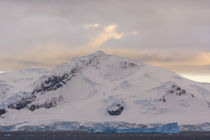 Paradise Harbor. Snowy mountains and clouds at sunrise. by Danita Delimont