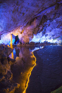 Multi Colored Lights in the Reed Flute Cave by Danita Delimont