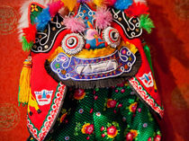 Chinese Colorful Souvenir Puppet Dragon Beijing, China by Danita Delimont