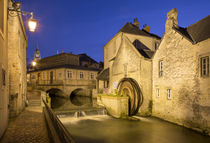 Dusk view over the mill along River Weir and medieval town o... by Danita Delimont