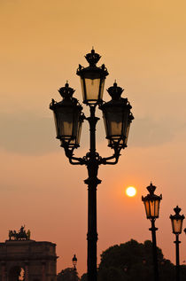 Lamp posts at sunset, Louvre Museum, Paris, France by Danita Delimont