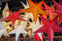 Hanging paper cutout star lamps, Christmas market, Mainz, Germany von Danita Delimont
