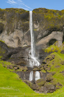 Foss a Sidu. Waterfall over the cliff. by Danita Delimont