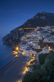 Evening view along the Amalfi coast of the hillside town of ... by Danita Delimont