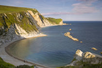 Evening overlooking Man O War Bay along the Jurassic Coast, ... by Danita Delimont