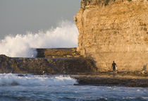 Surfer sizing up the challenge by Danita Delimont