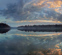 Beautifully lit clouds drift over Lake Jean, Ricketts Glen S... by Danita Delimont