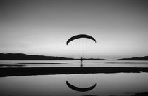 Powered paraglider over the Great Salt Lake by Danita Delimont