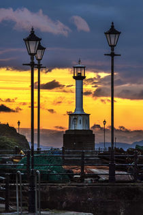 Maryport Lighthouse At Sunset by Ian Lewis