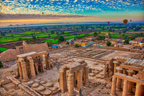 Hot Air Balloon at Sunrise in over Ruins in Luxor Egypt by Andy Doyle