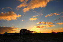 Lodernder Winterhimmel von Regina Raaf