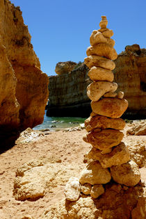 Stone Sculpture on rocky coast by Felix Van Zyl