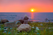 Meditation tower on the sea coast at sunset by Marie Selissky