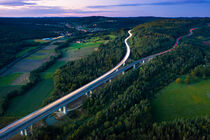 Aerial view of highway splitting aound forest hill von raphotography88